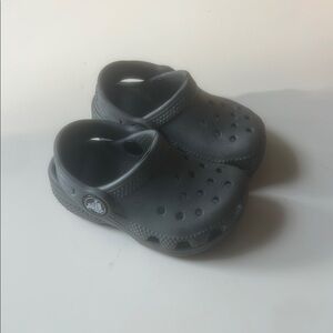 CROCS Black Slippers with Ventilation Holes and Heel Strap